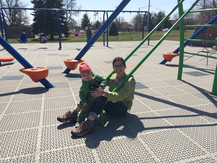 Erynn and JB on the playground in Bettendorf